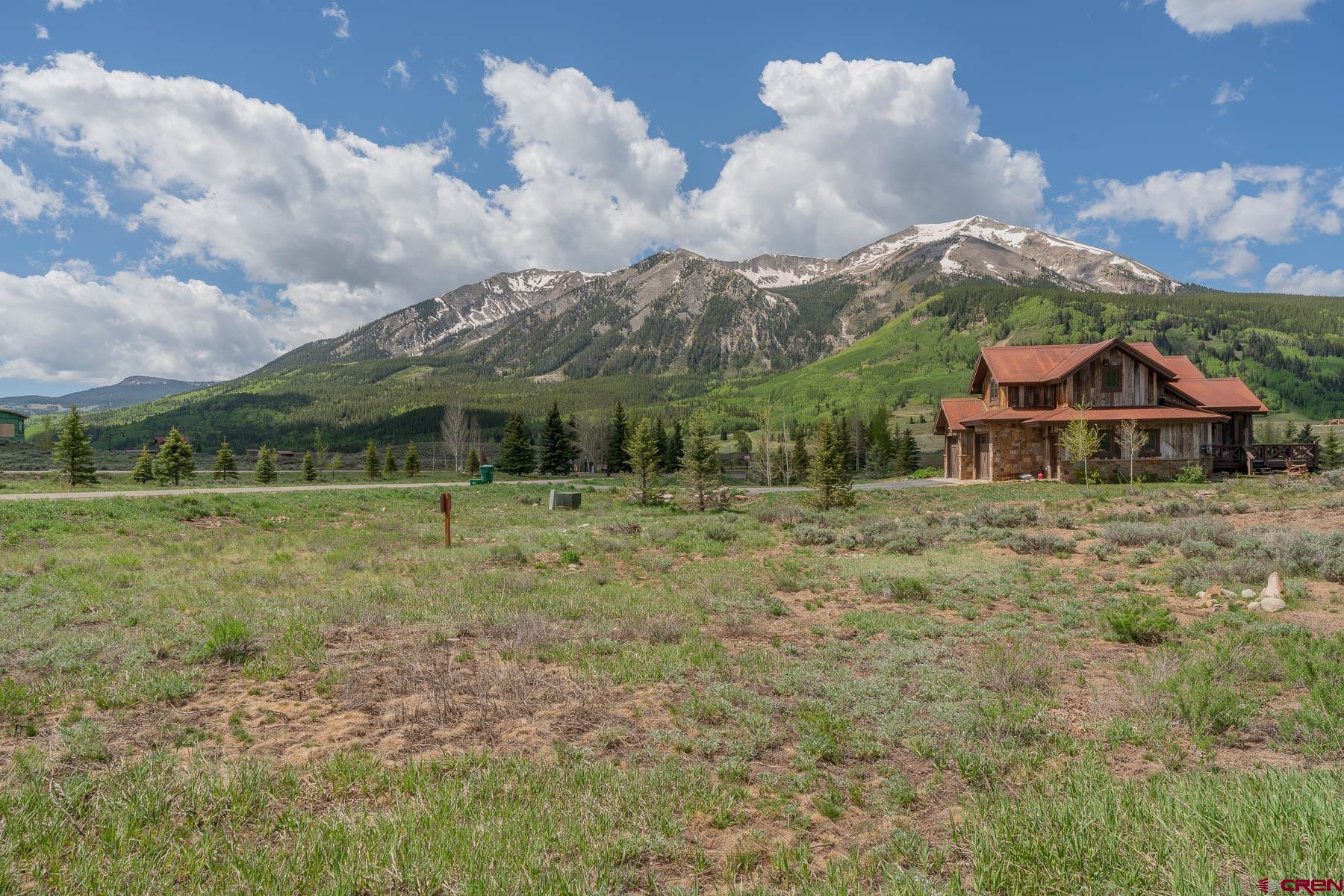 47 Fairway Lane Crested Butte, CO 81224 - Photo 11 of 32 a view of house with a big yard