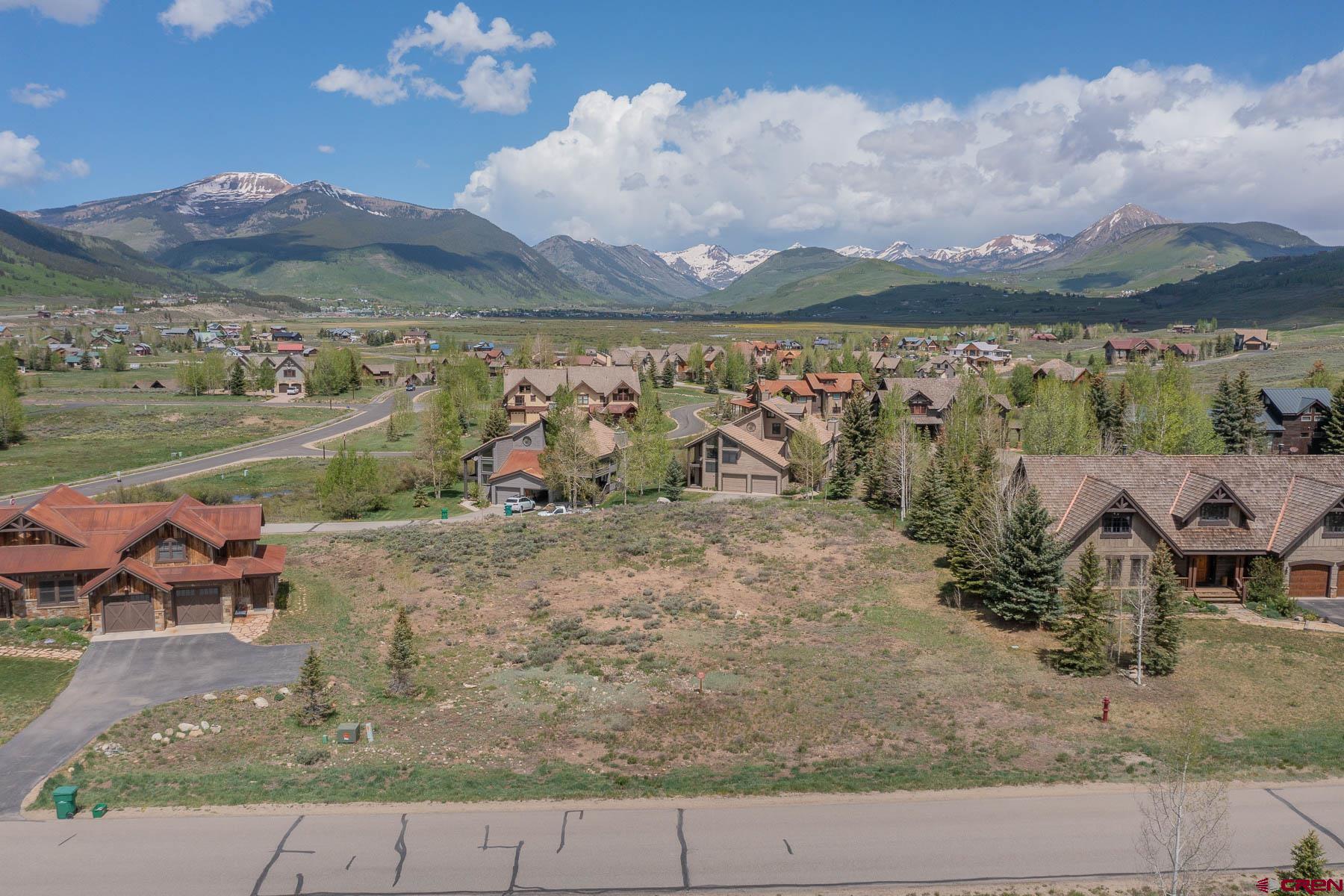 47 Fairway Lane Crested Butte, CO 81224 - Photo 16 of 32 an aerial view of a house with a lake view