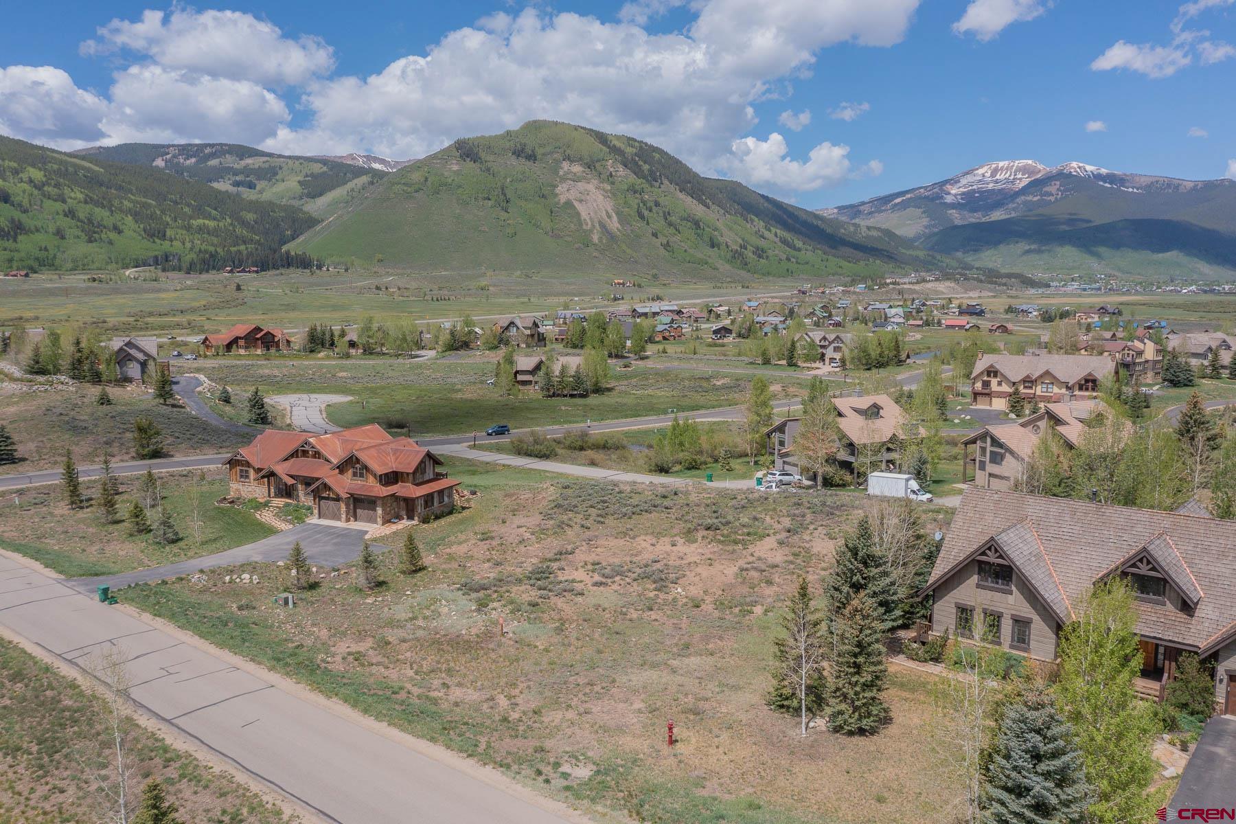 47 Fairway Lane Crested Butte, CO 81224 - Photo 17 of 32 a view of a lake with a mountain