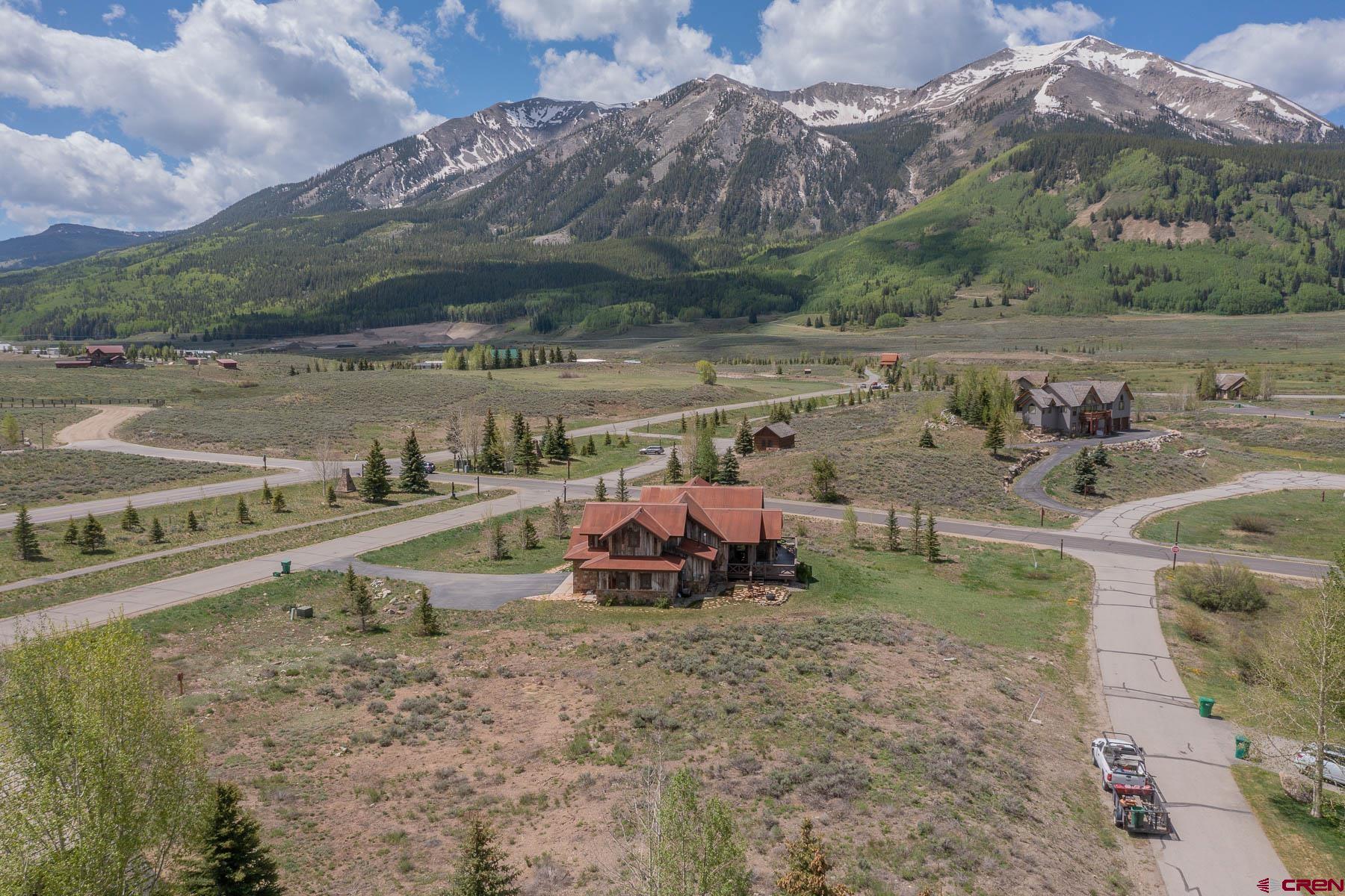 47 Fairway Lane Crested Butte, CO 81224 - Photo 18 of 32 a view of a town with mountains in the background