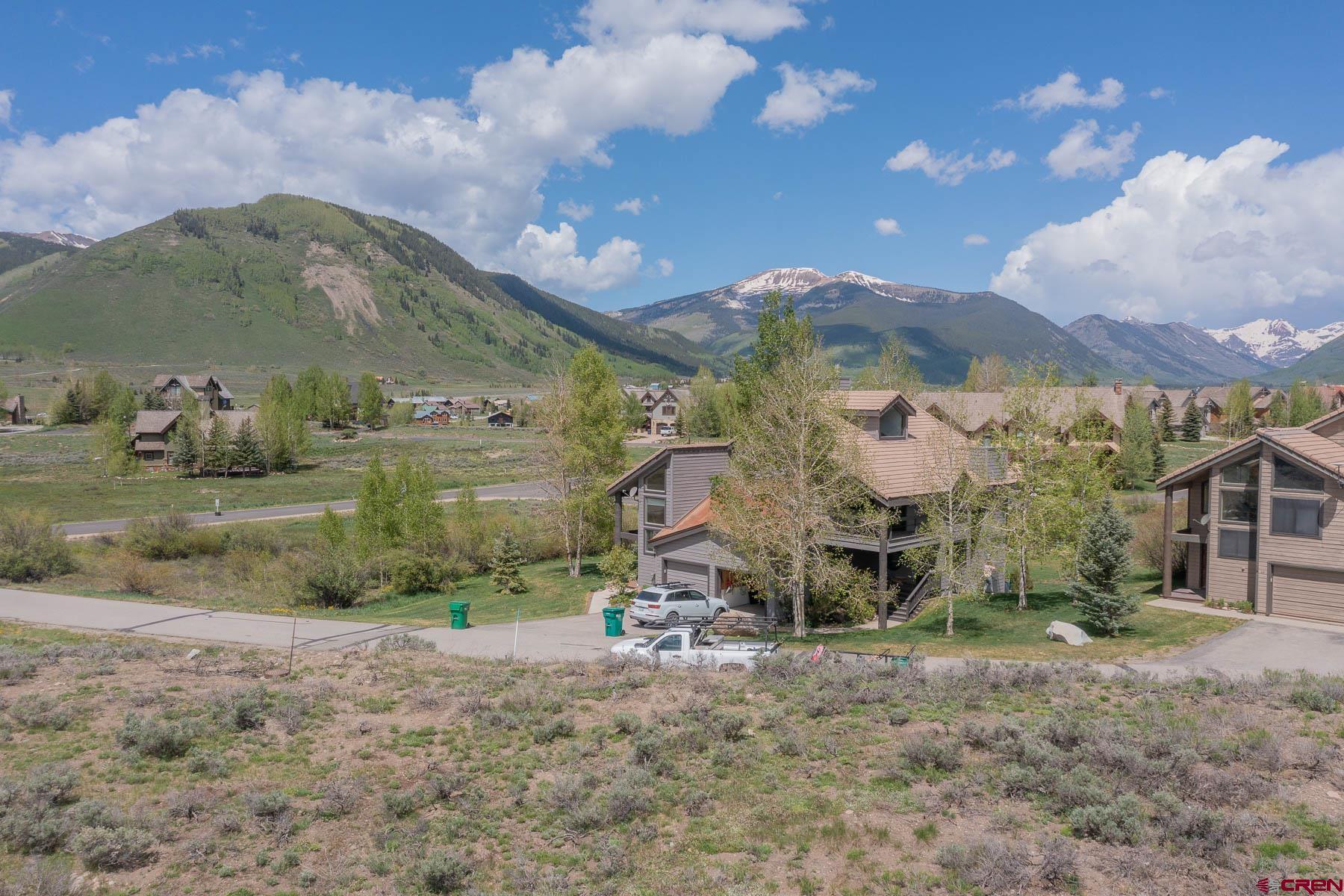 47 Fairway Lane Crested Butte, CO 81224 - Photo 20 of 32 a view of a house with a yard