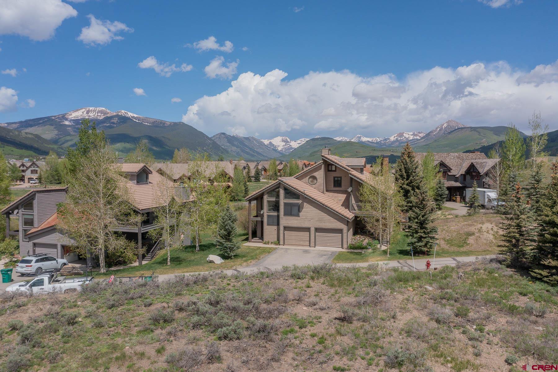 47 Fairway Lane Crested Butte, CO 81224 - Photo 21 of 32 a view of a house with a yard