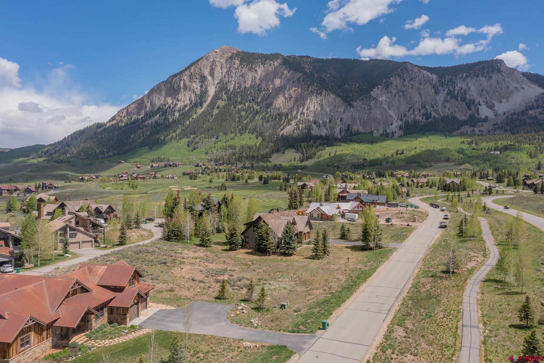 47 Fairway Lane Crested Butte, CO 81224 - Photo 28 of 32 a view of a lake with a mountain in the background