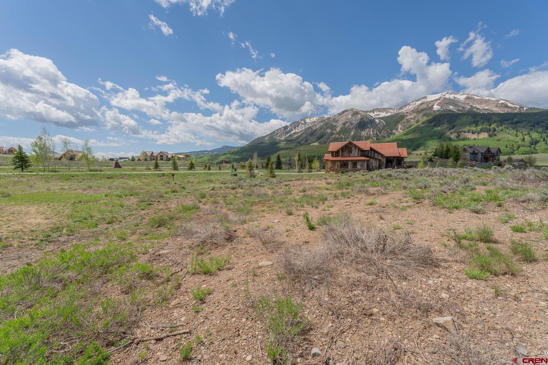 47 Fairway Lane Crested Butte, CO 81224 - Photo 7 of 32 a view of a big yard with lots of green space