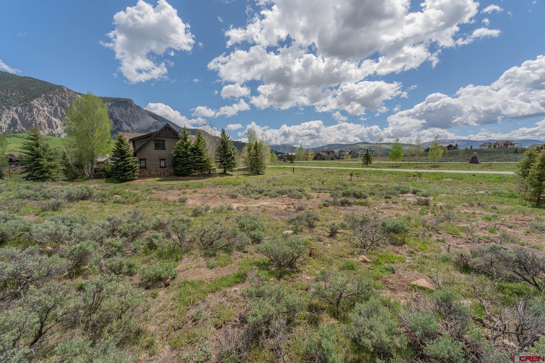 47 Fairway Lane Crested Butte, CO 81224 - Photo 9 of 32 a view of a house with a big yard