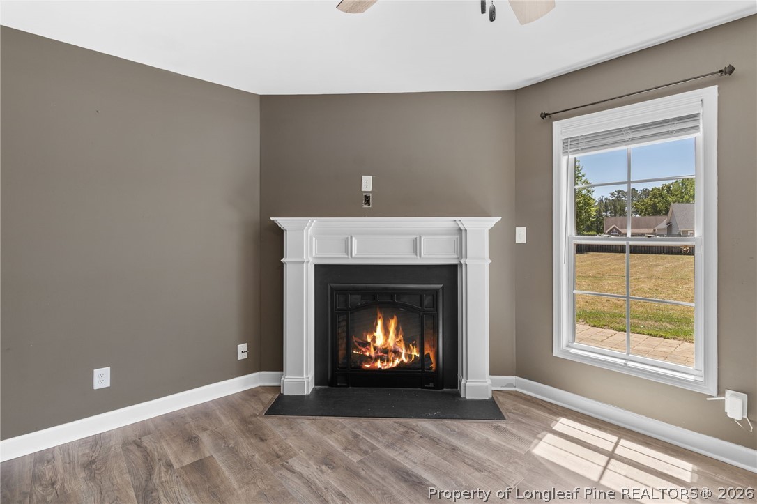 269 Declaration Drive Raeford, NC 28376 - Photo 11 of 44 a living room with a fireplace and a fireplace