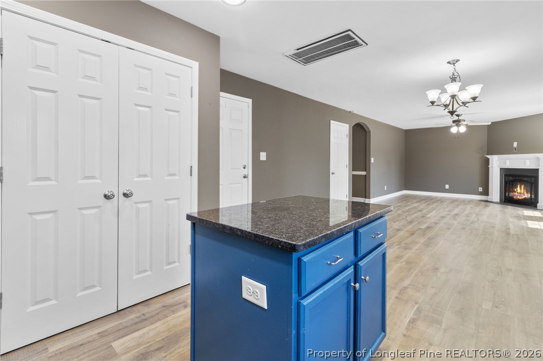 269 Declaration Drive Raeford, NC 28376 - Photo 18 of 44 a bathroom with a granite countertop sink and a mirror