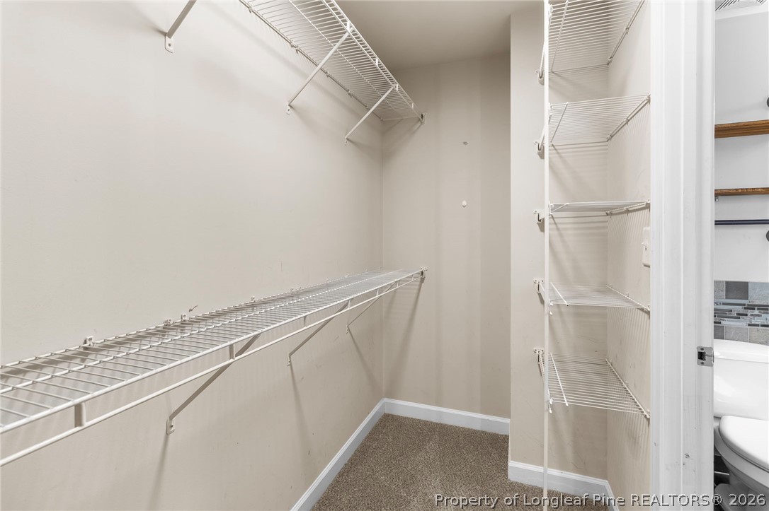 269 Declaration Drive Raeford, NC 28376 - Photo 27 of 44 a view of walk in closet with empty racks
