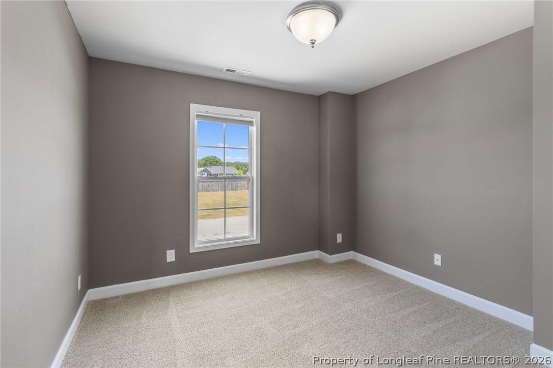 269 Declaration Drive Raeford, NC 28376 - Photo 28 of 44 an empty room with a window