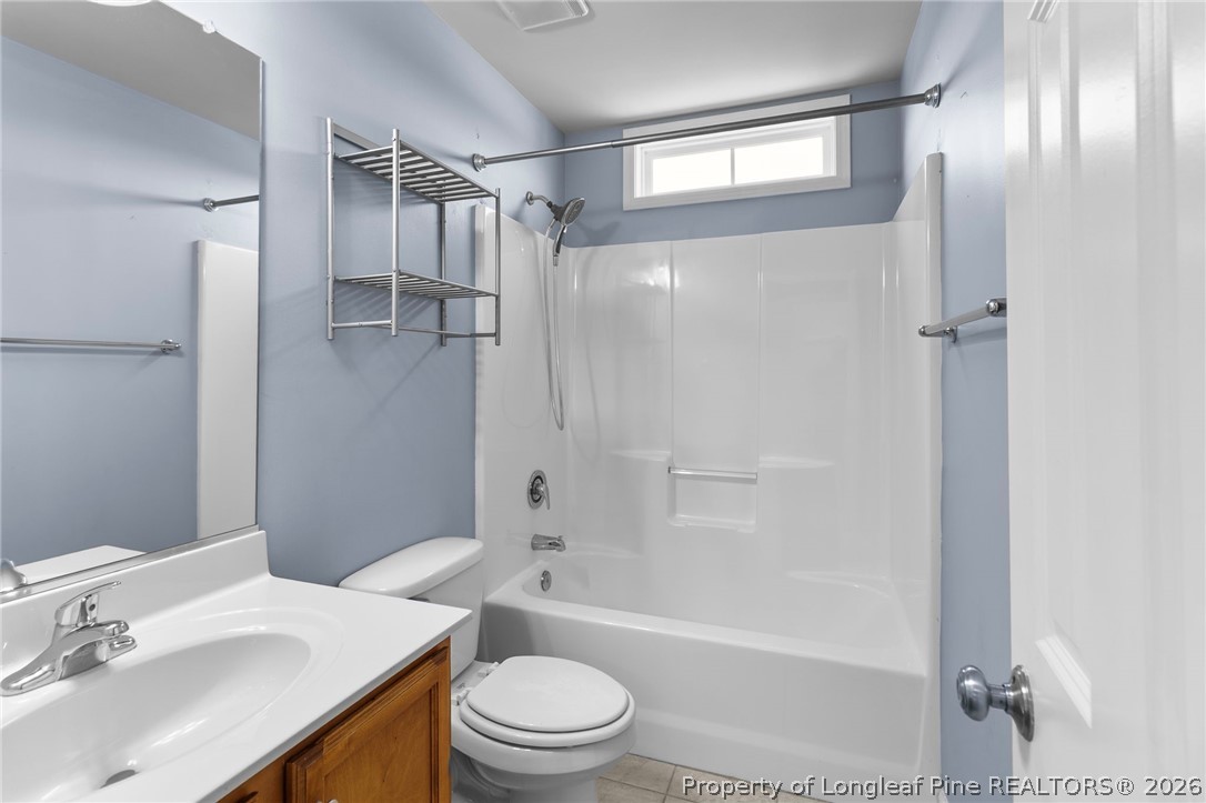269 Declaration Drive Raeford, NC 28376 - Photo 32 of 44 a bathroom with a sink a toilet and shower
