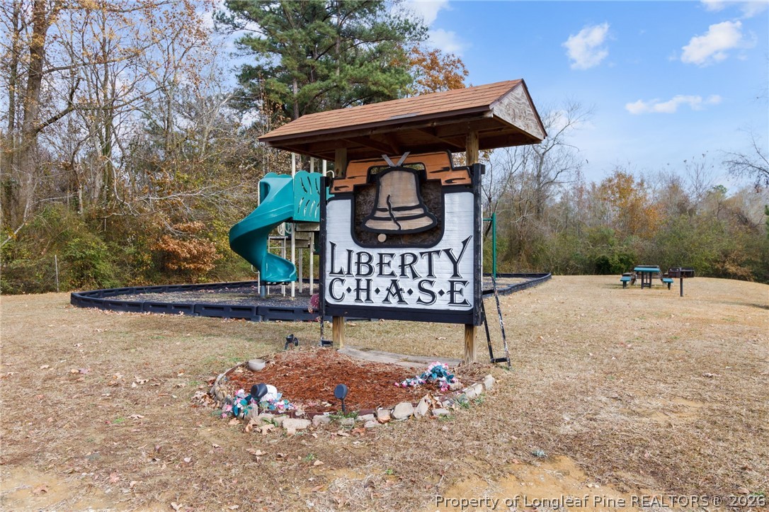 269 Declaration Drive Raeford, NC 28376 - Photo 43 of 44 a view of outdoor space with seating area and trees