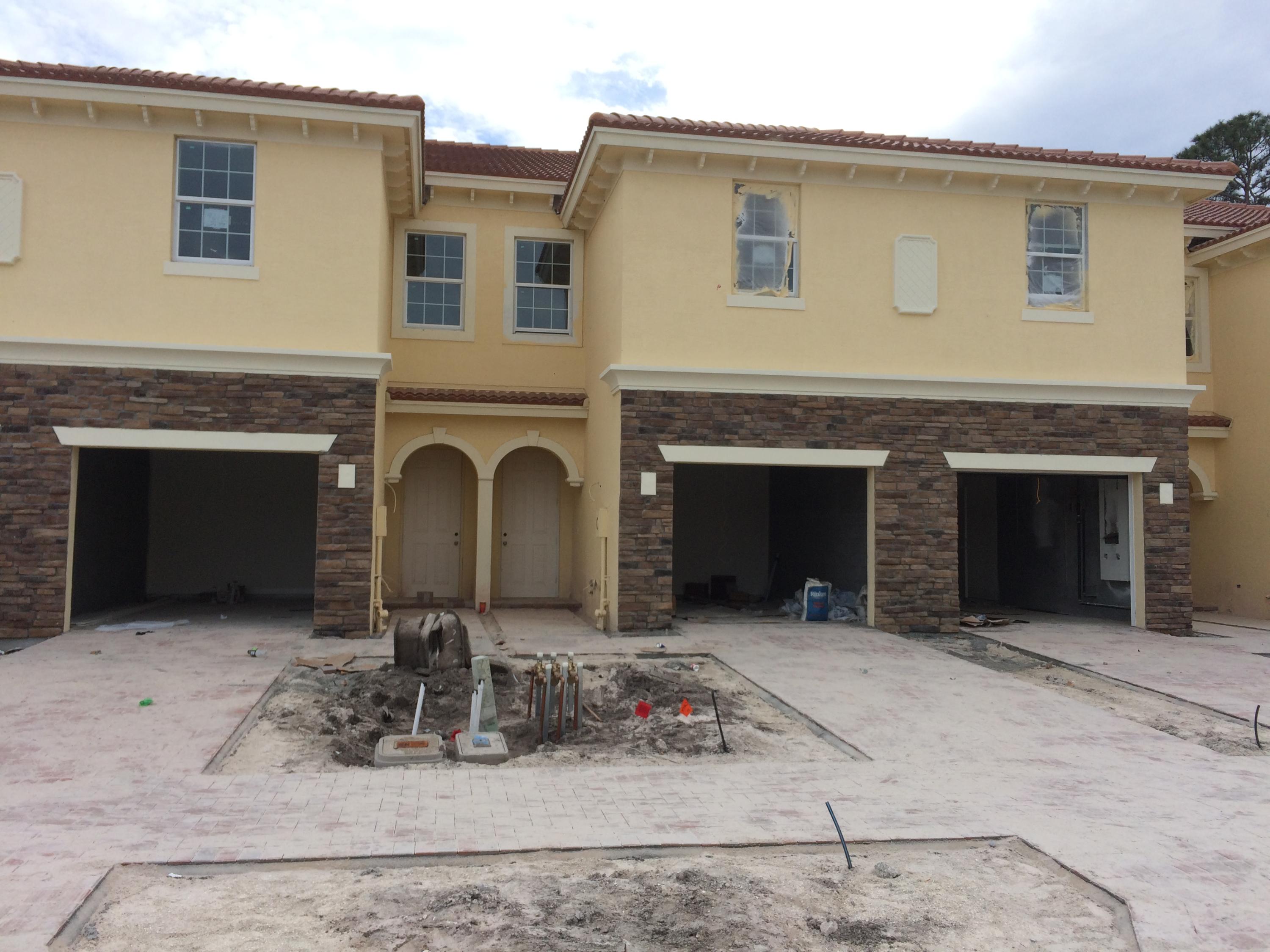 9614 Southwest Purple Martin Way Stuart, FL 34997 - Photo 1 of 8 Front Elevation