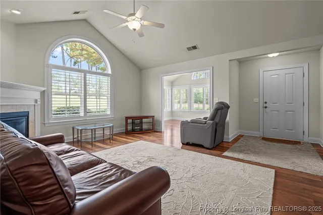 a bedroom with a balcony a bed and a couch