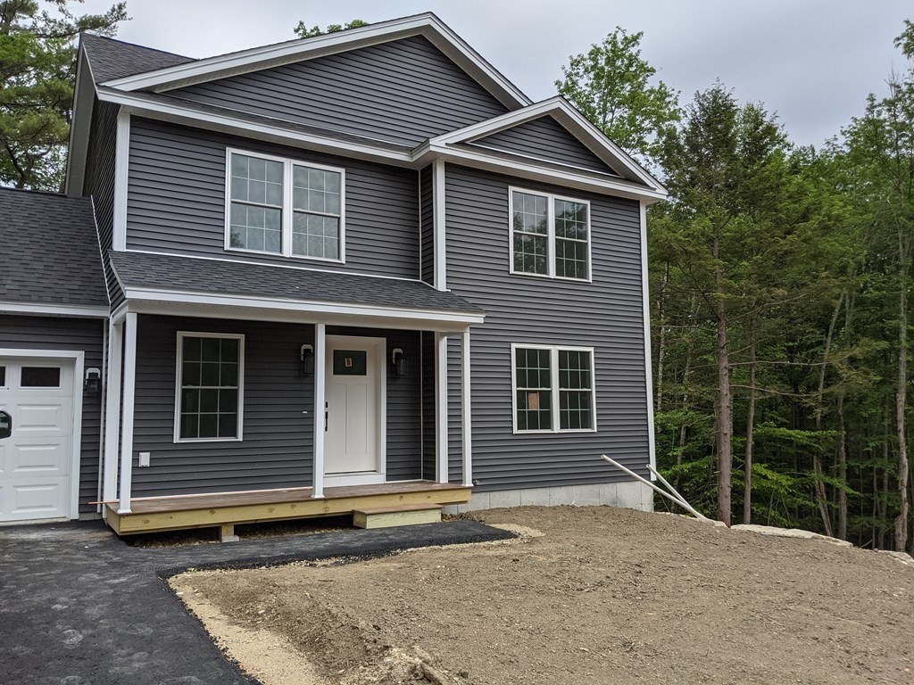 0 Nh Rt 119 Rindge, NH 03461 - Photo 2 of 11 a view of a house with a door and wooden fence