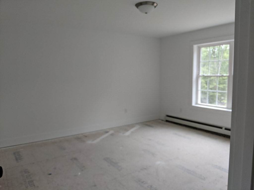 0 Nh Rt 119 Rindge, NH 03461 - Photo 9 of 11 an empty room with a window