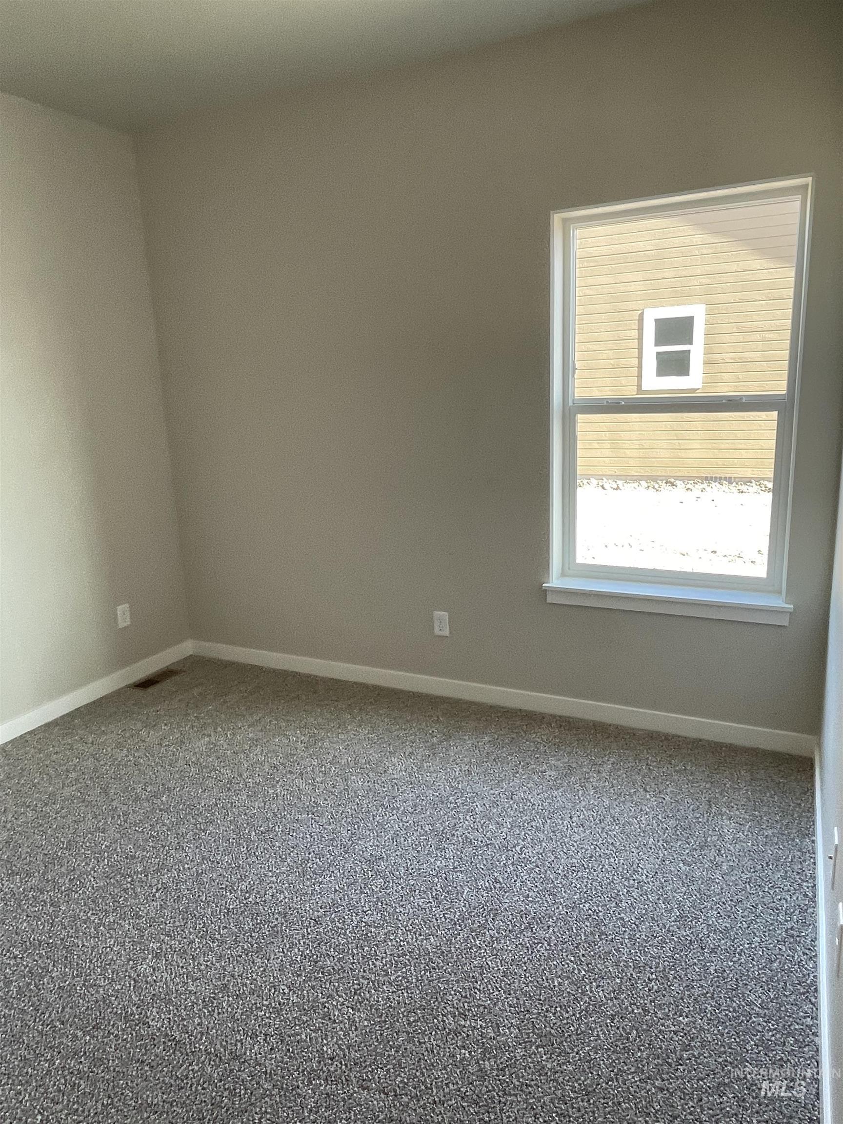 939 Quartz Road Kimberly, ID 83341 - Photo 16 of 18 Carpeted spare room featuring baseboards
