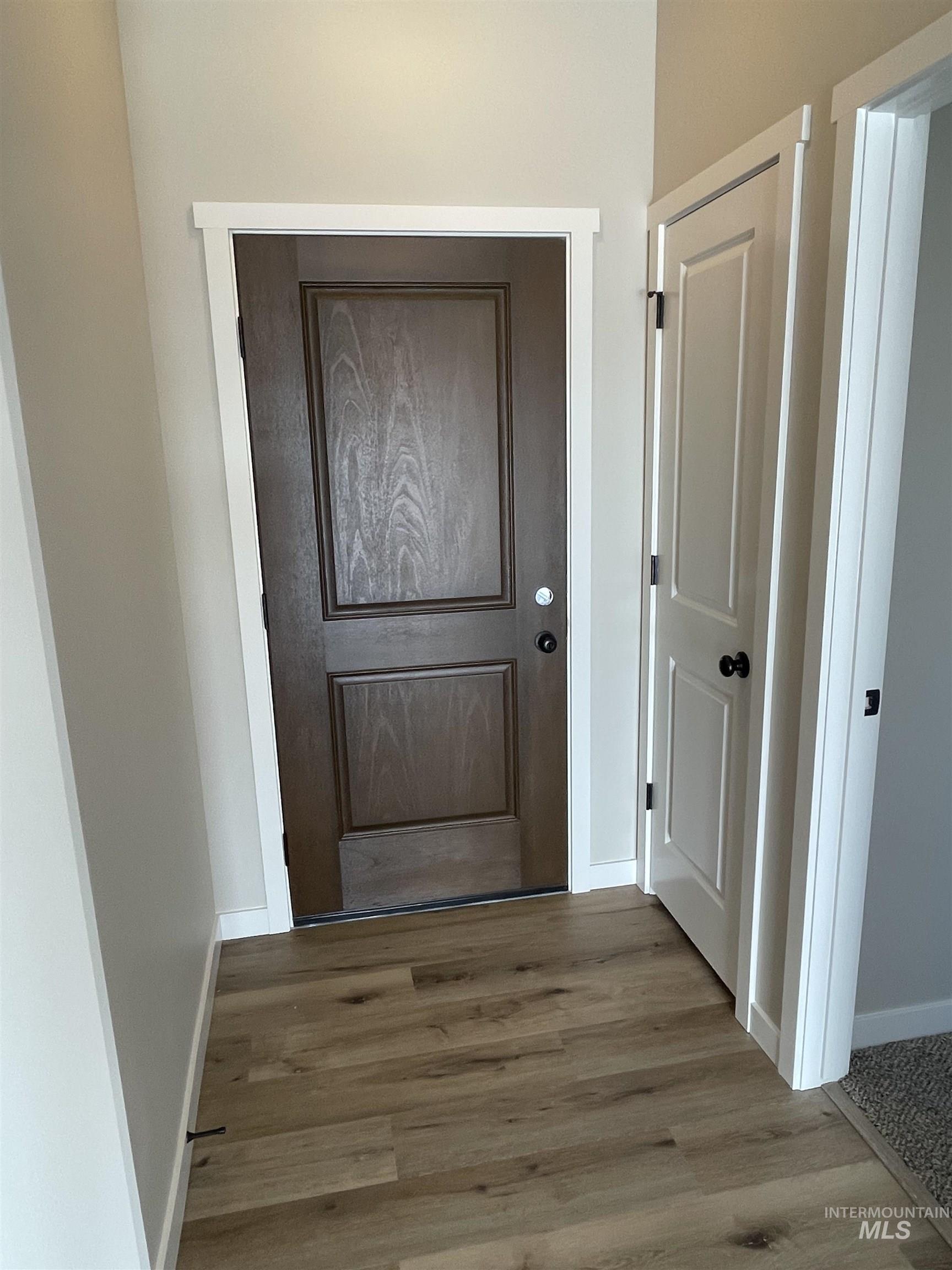 939 Quartz Road Kimberly, ID 83341 - Photo 6 of 18 Doorway with wood finished floors and baseboards