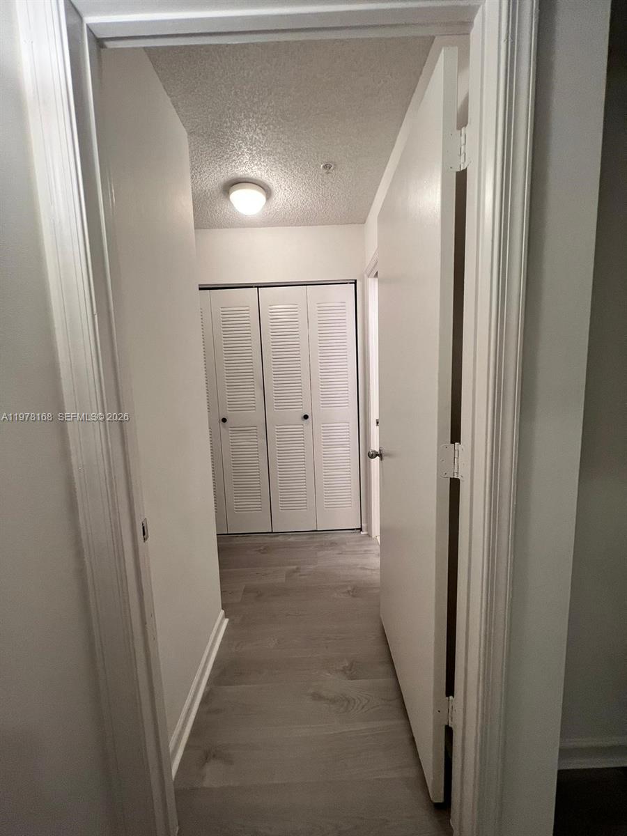 2173 Renaissance Boulevard, Unit 201 Miramar, FL 33025 - Photo 12 of 12 a view of hallway