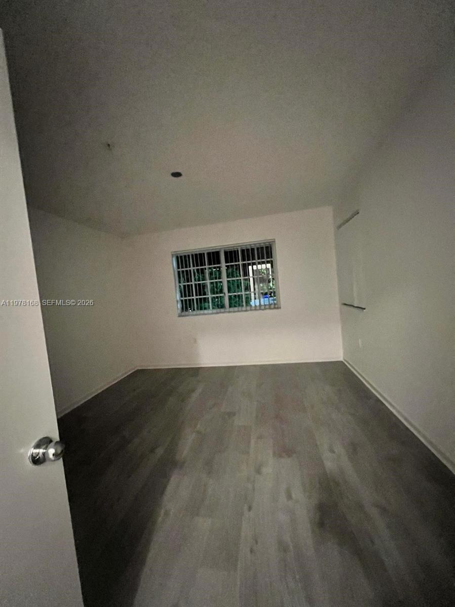 2173 Renaissance Boulevard, Unit 201 Miramar, FL 33025 - Photo 5 of 12 an empty room with a window