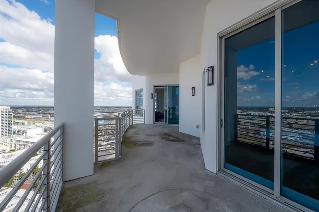 a view of a balcony with city view