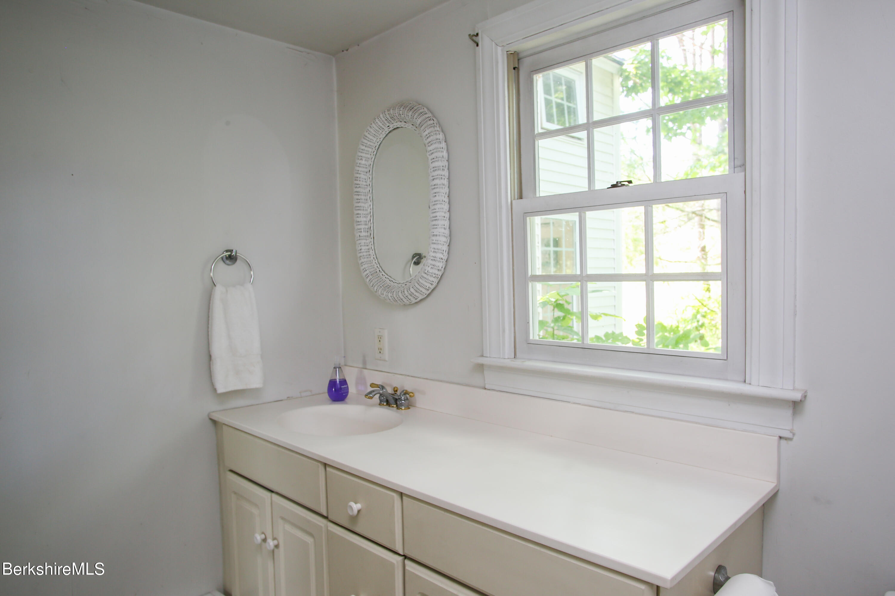1256 East Windsor Road Windsor, MA 01270 - Photo 20 of 34 a bathroom with a sink and a window