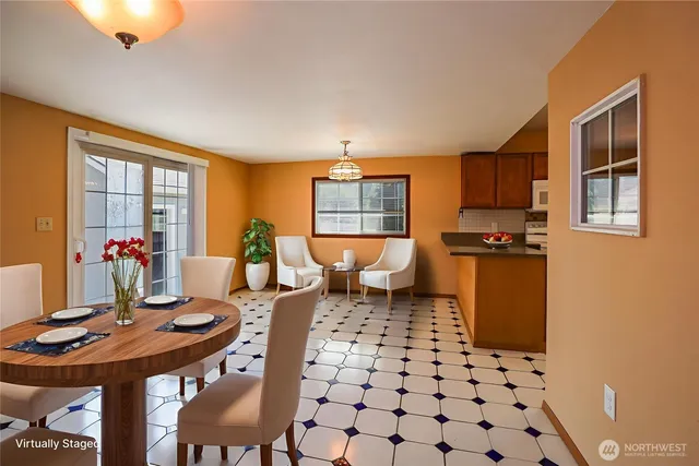 a view of a hallway with a black white checkered floor