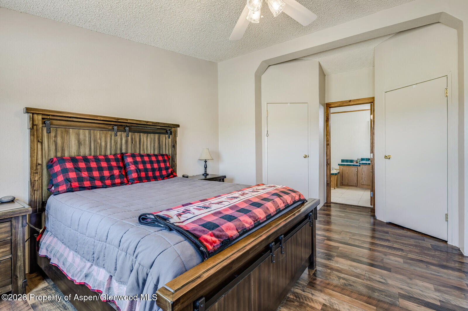 2880 County Road 233 Rifle, CO 81650 - Photo 14 of 47 a bedroom with a bed and a window