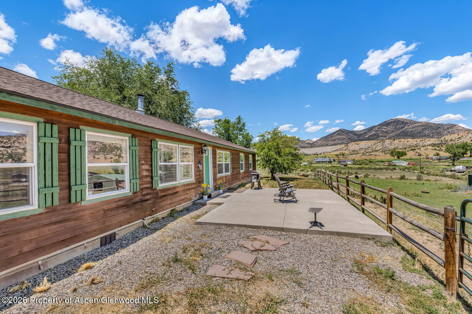 2880 County Road 233 Rifle, CO 81650 - Photo 29 of 47 a view of a house with a backyard