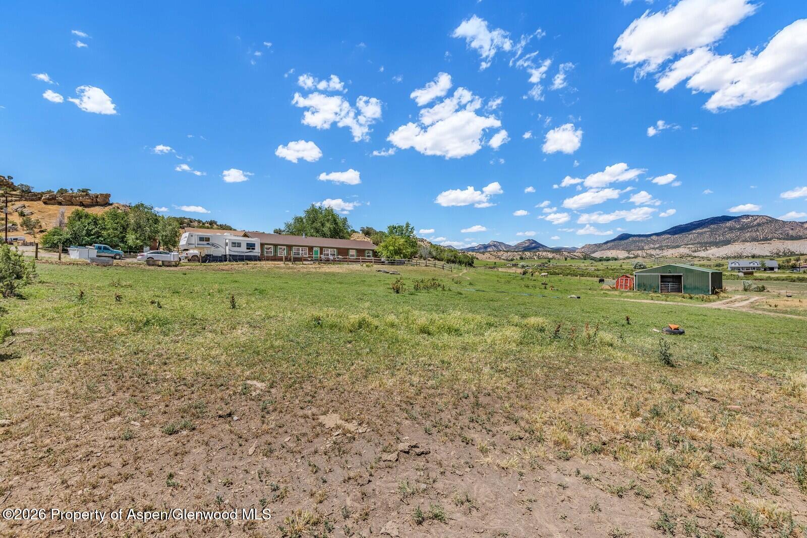 2880 County Road 233 Rifle, CO 81650 - Photo 38 of 47 a view of a big yard with lots of green space