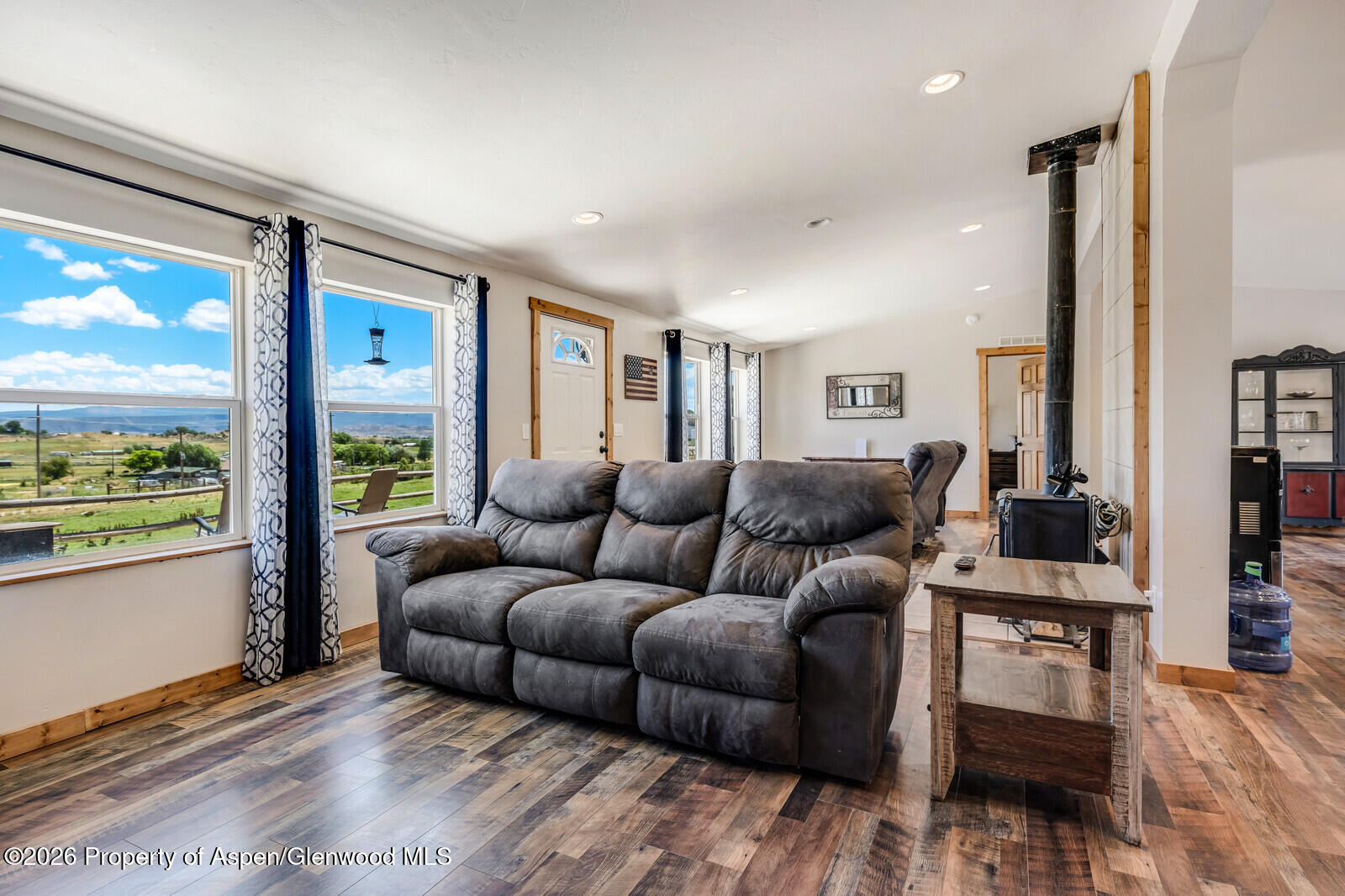 2880 County Road 233 Rifle, CO 81650 - Photo 9 of 47 a living room with furniture and a large window
