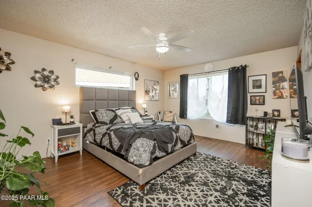 a bed room with a bed and a couch