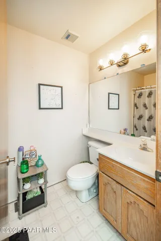 a view of a chairs and tables on the roof deck