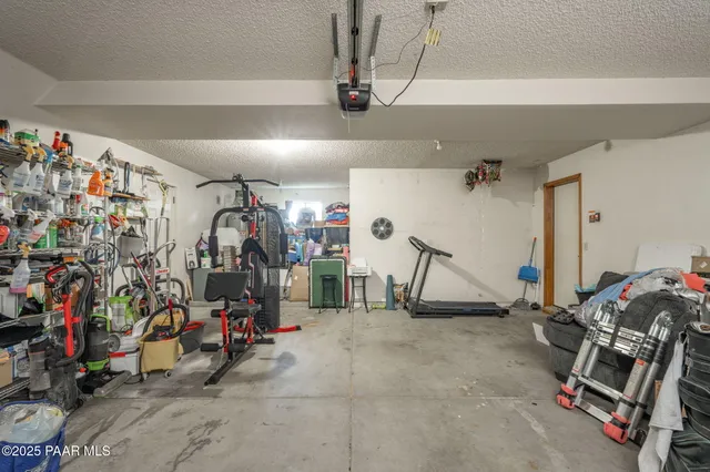 a balcony with furniture and a potted plant