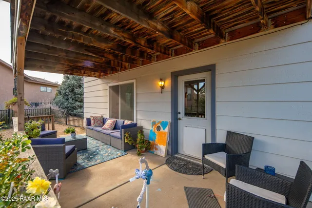 an aerial view of residential building and lake