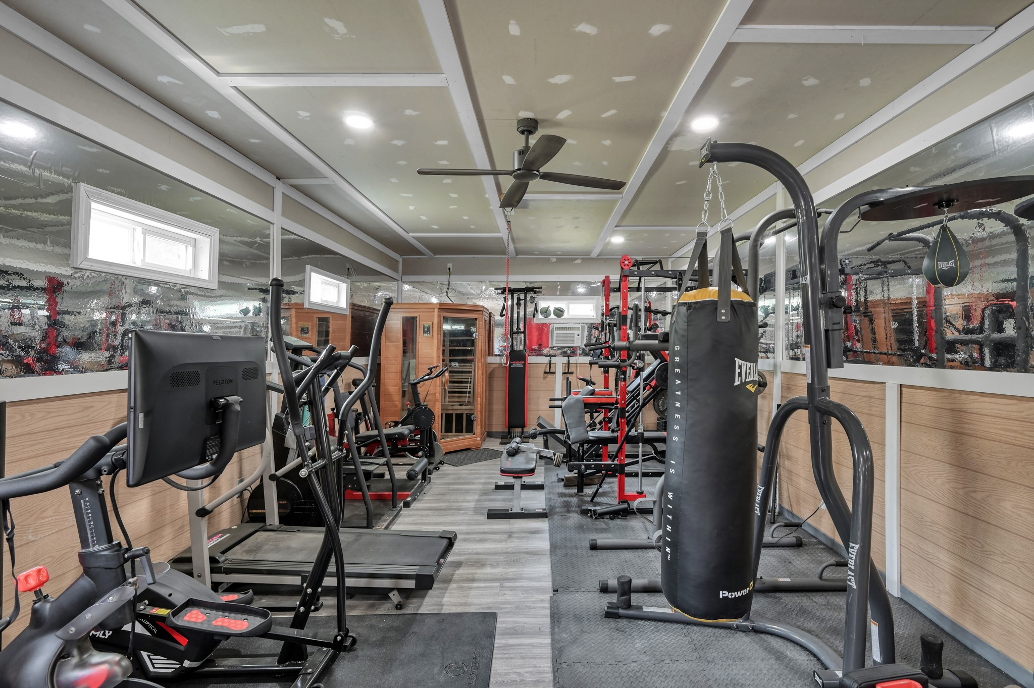 144 Wood Farm Road Huntsville, TX 77320 - Photo 24 of 35 a view of a room with gym equipment