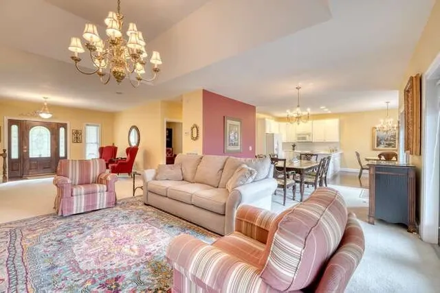 a bedroom with a bed and a table