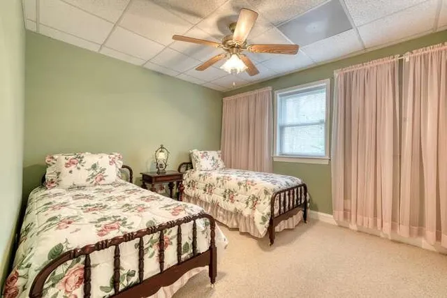 an aerial view of residential house and green space