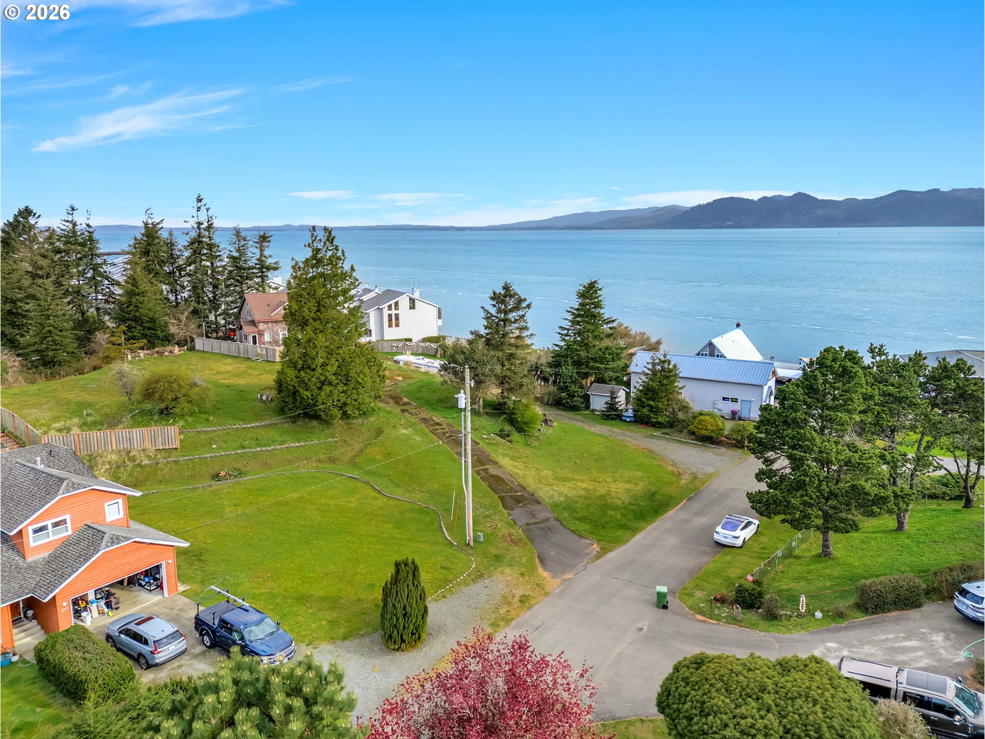 575 Gray Street Hammond, OR 97121 - Photo 2 of 11 a view of a lake with a yard