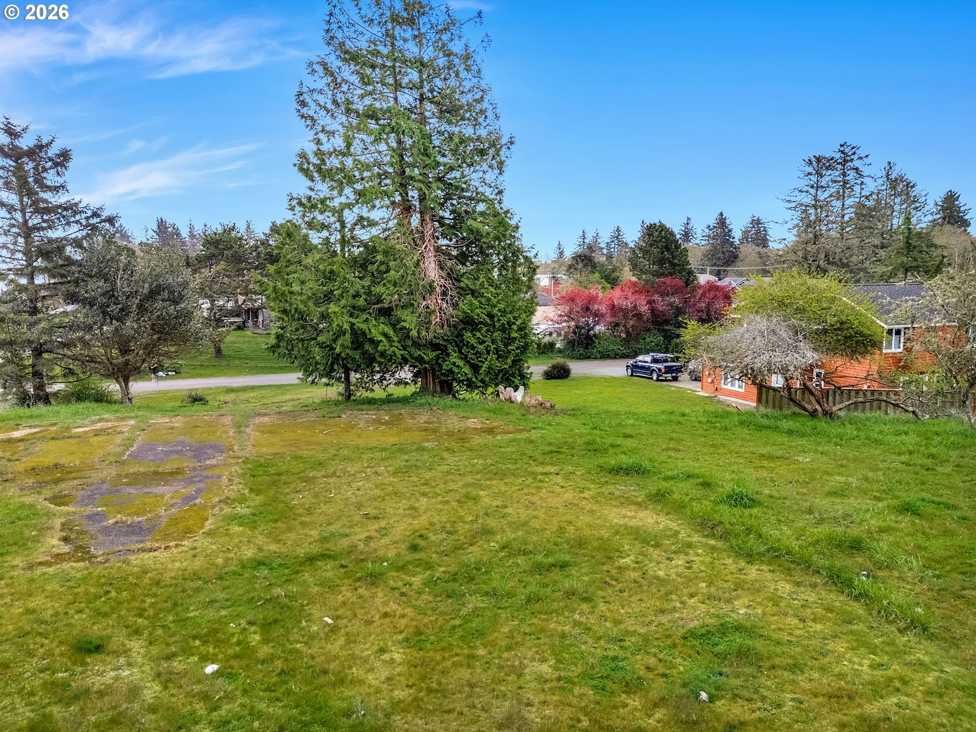 575 Gray Street Hammond, OR 97121 - Photo 4 of 11 a view of a house with a big yard
