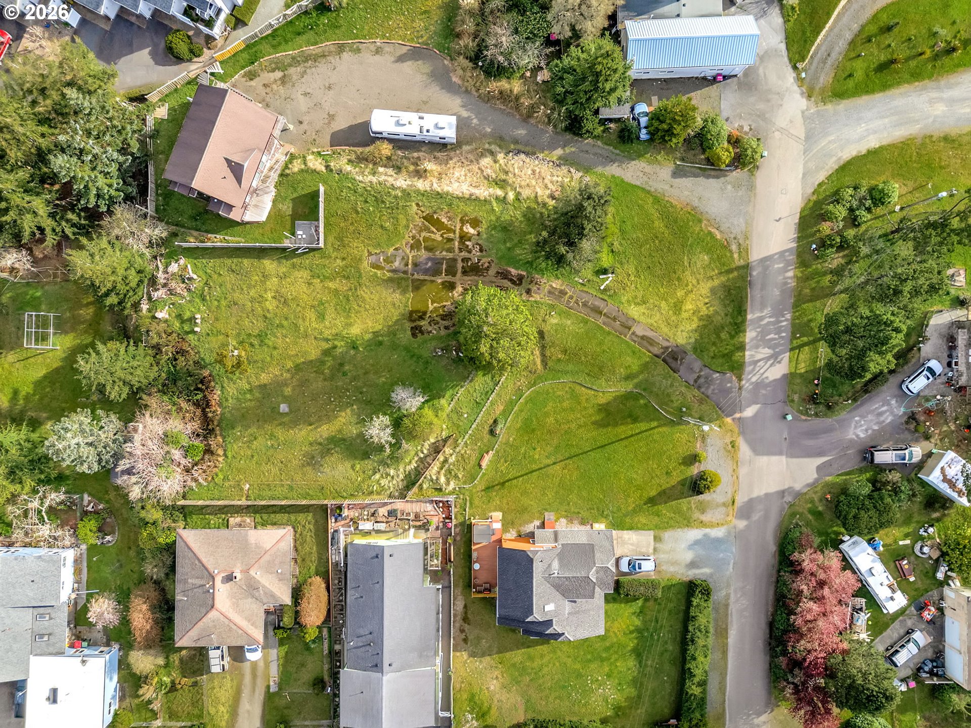 575 Gray Street Hammond, OR 97121 - Photo 7 of 11 an aerial view of residential house with outdoor space and swimming pool