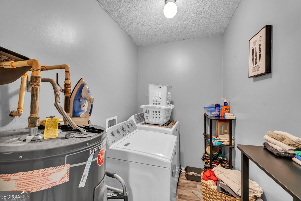 707 East 3rd Avenue Cordele, GA 31015 - Photo 16 of 21 a utility room with dryer and washer