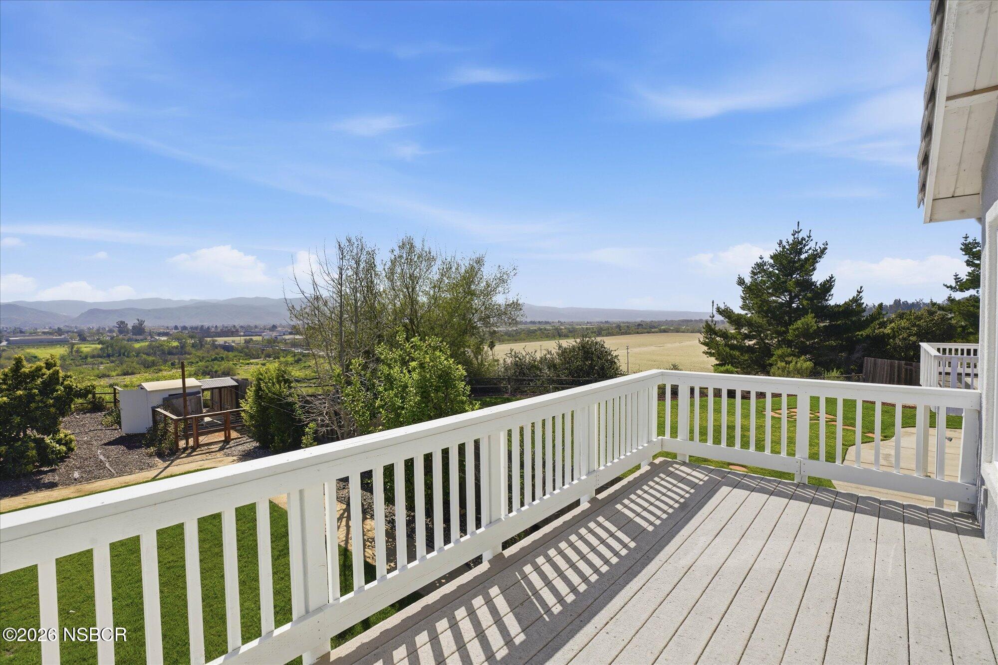 280 Rinconcito Lompoc, CA 93436 - Photo 24 of 39 a view of a two chairs with wooden floor in front of yard