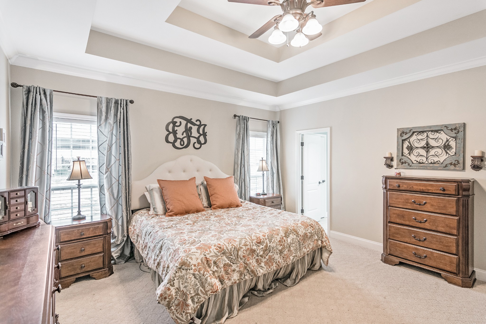 138 Rock Bridge Road Gallatin, TN 37066 - Photo 12 of 37 a bedroom with a bed and a chandelier