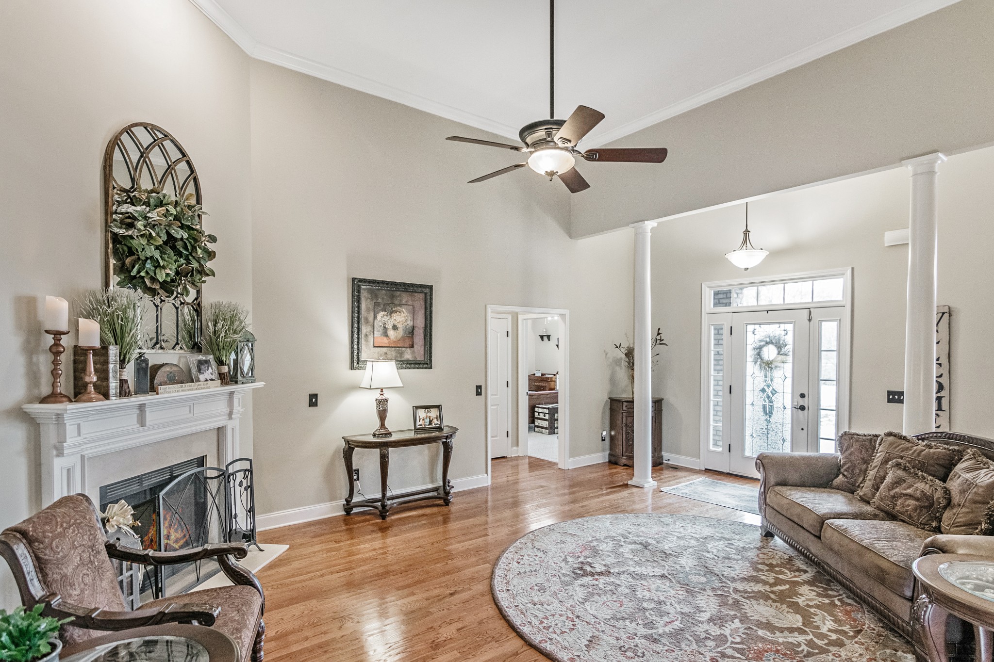 138 Rock Bridge Road Gallatin, TN 37066 - Photo 8 of 37 a living room with furniture and a chandelier