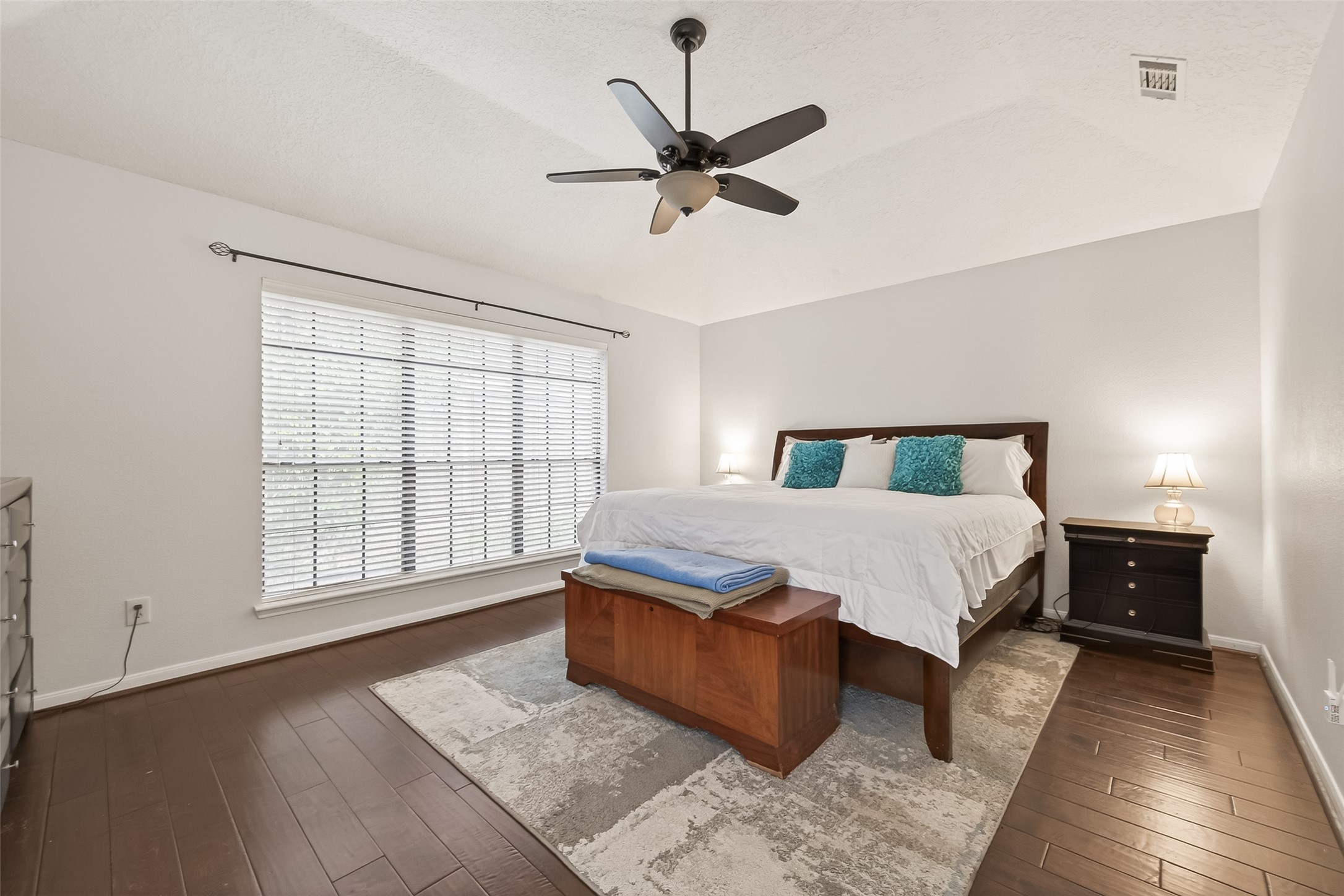 18526 Fawn Run Lane Houston, TX 77084 - Photo 16 of 47 a bedroom with a large bed and a large window