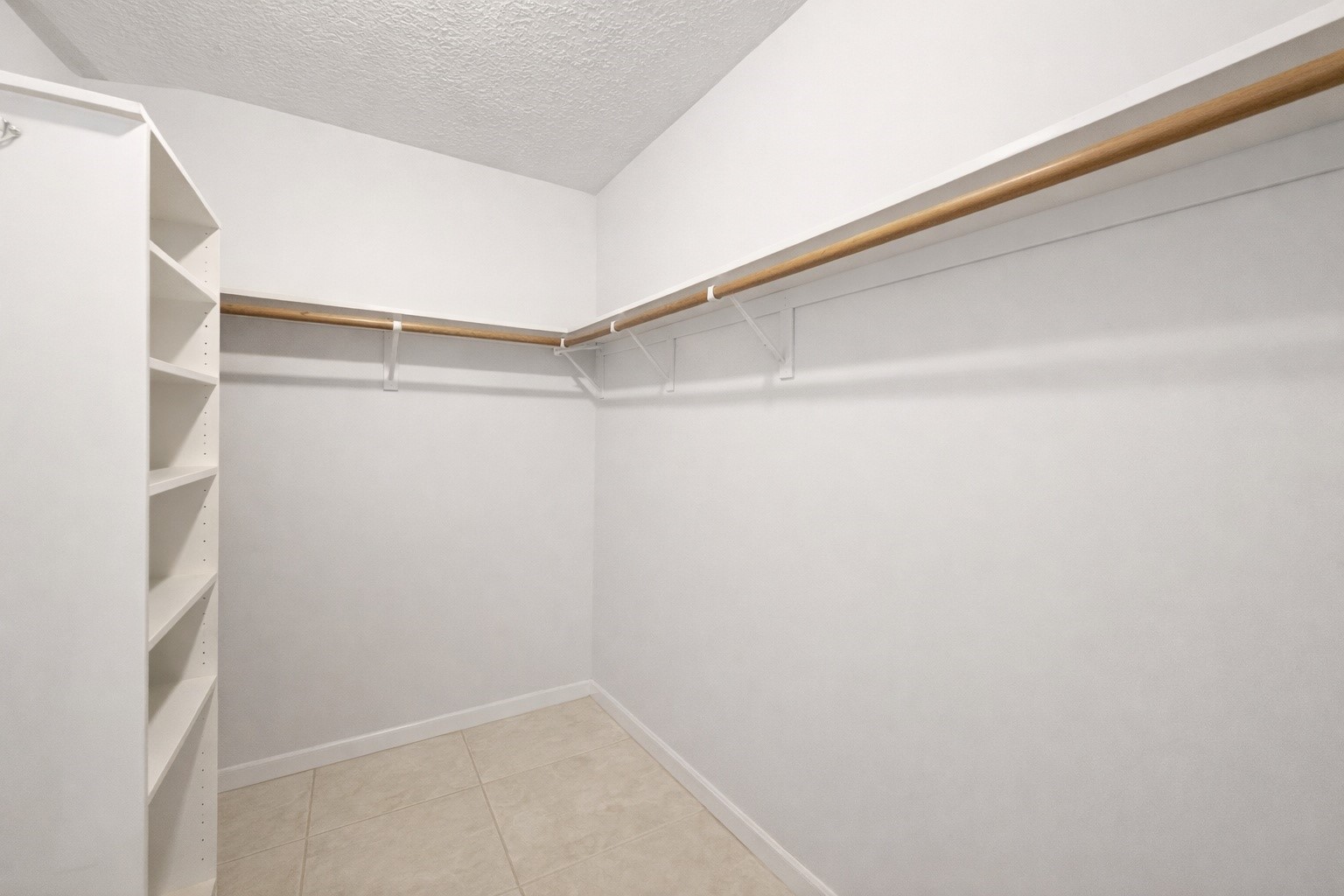 18526 Fawn Run Lane Houston, TX 77084 - Photo 23 of 47 a view of an empty walk in closet