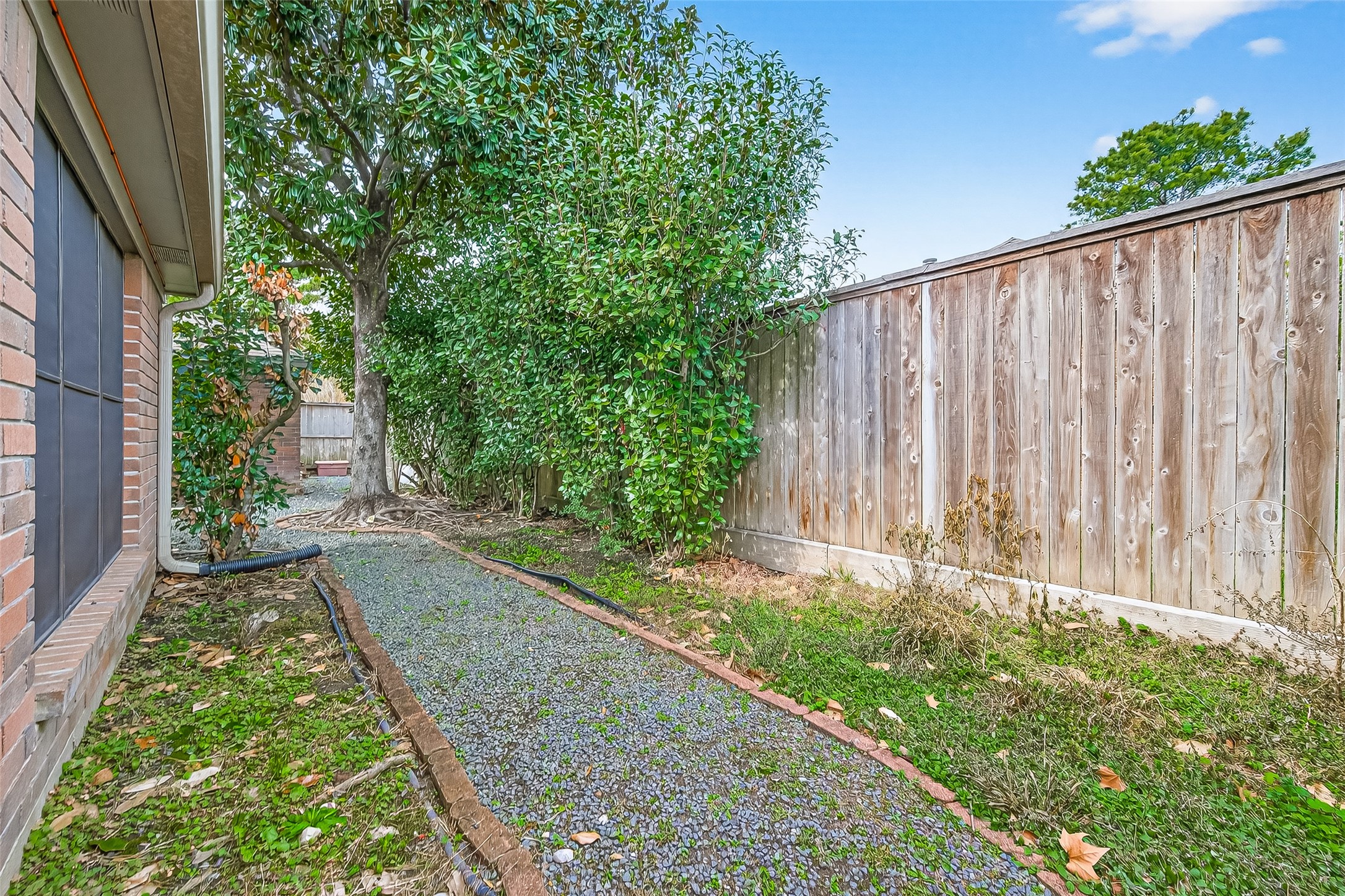 18526 Fawn Run Lane Houston, TX 77084 - Photo 35 of 47 a view of a backyard with pathway