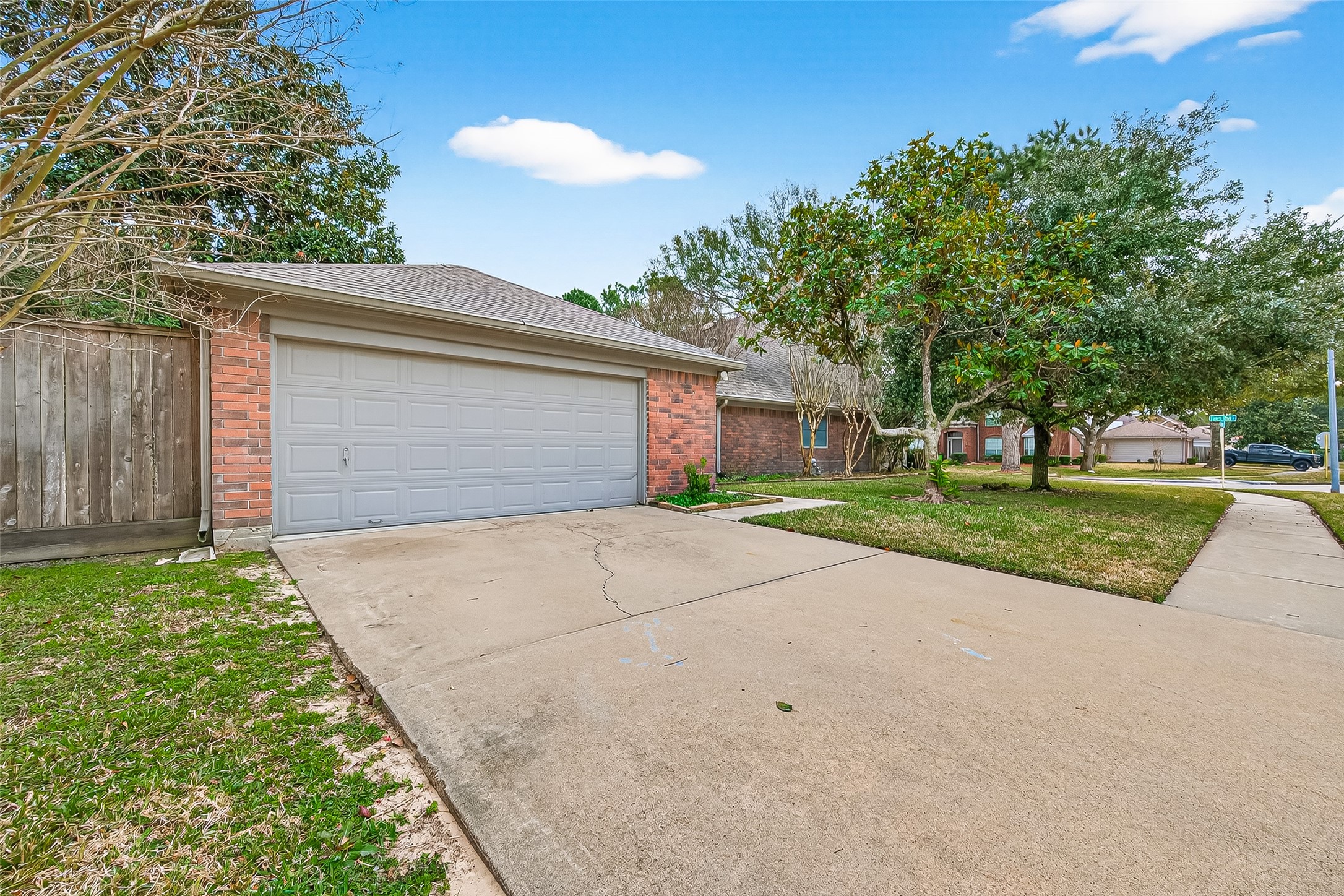 18526 Fawn Run Lane Houston, TX 77084 - Photo 38 of 47 a front view of a house with a yard and garage