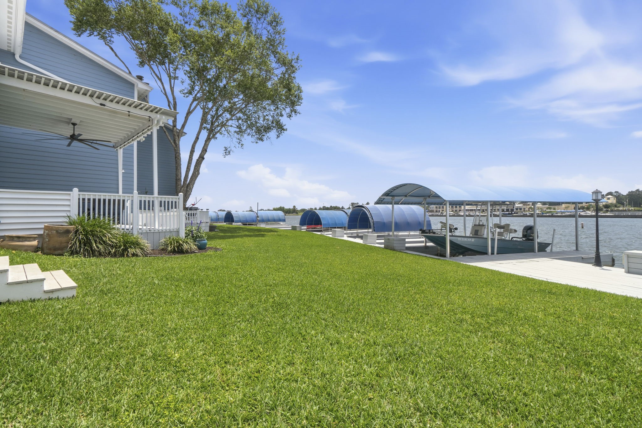 2 Key Harbour Conroe, TX 77356 - Photo 36 of 41 a view of a house with a yard