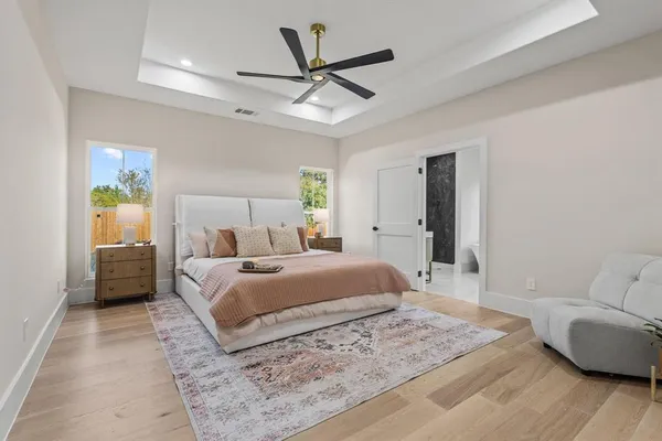 a bedroom with a bed and furniture